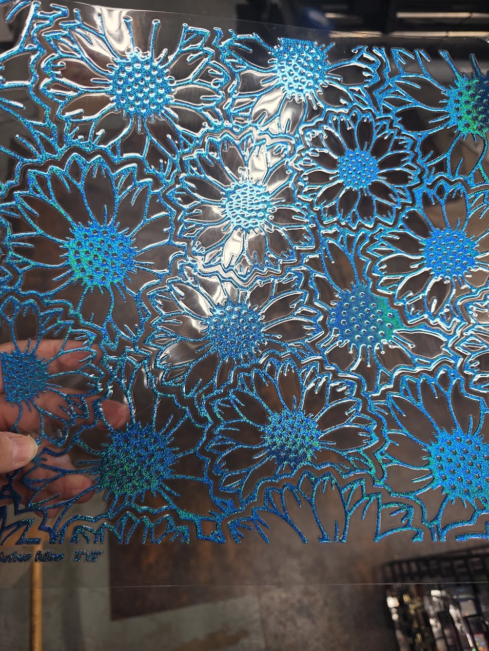 UVDTF Prism Blue Holographic Sunflower Outlines 11"x11"