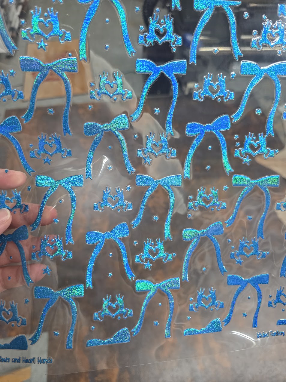 UVDTF Prism Blue Holographic Bows and Heart Hands 11"x11"