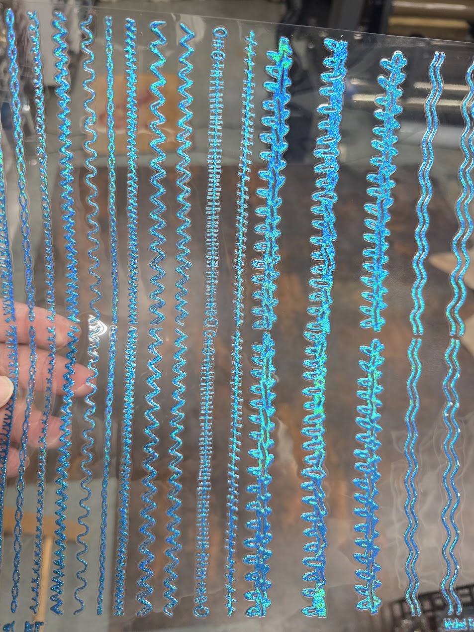 UVDTF Prism Blue Holographic Stitches 11"x11"