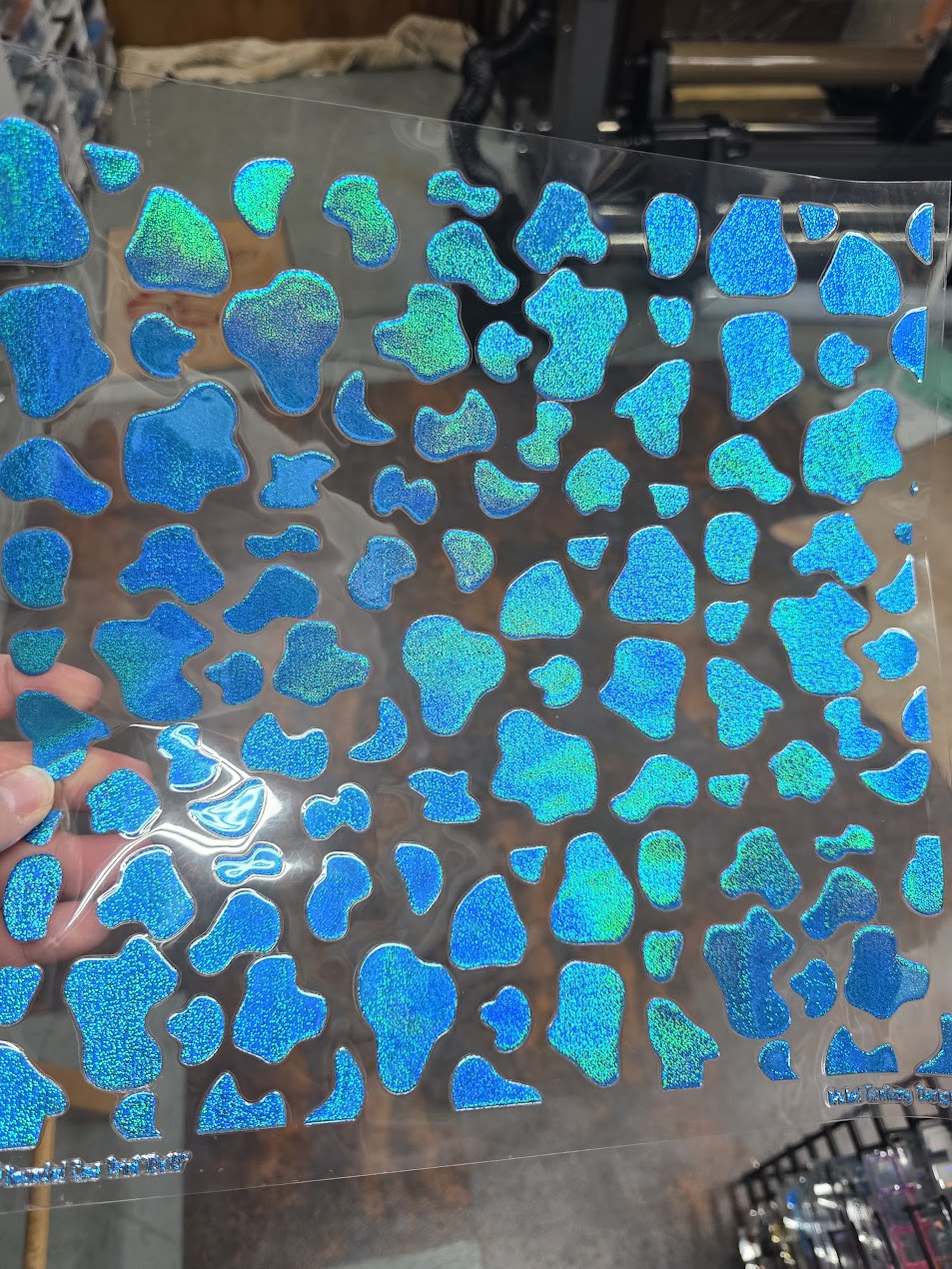 UVDTF Prism Blue Holographic Rounded Cow Print 11"x11"