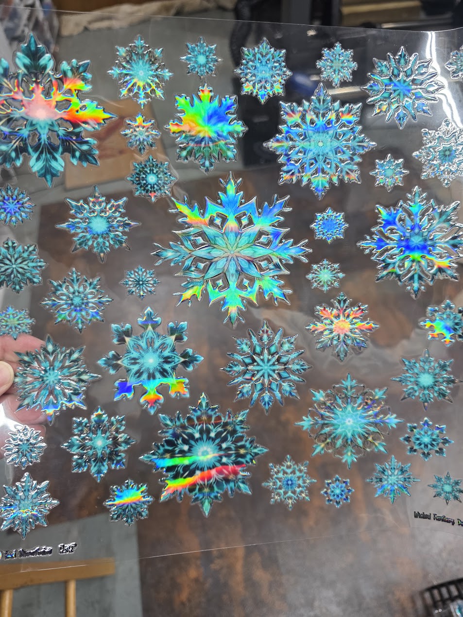 UVDTF Laser Holographic Teal Snowflakes 11"x11"