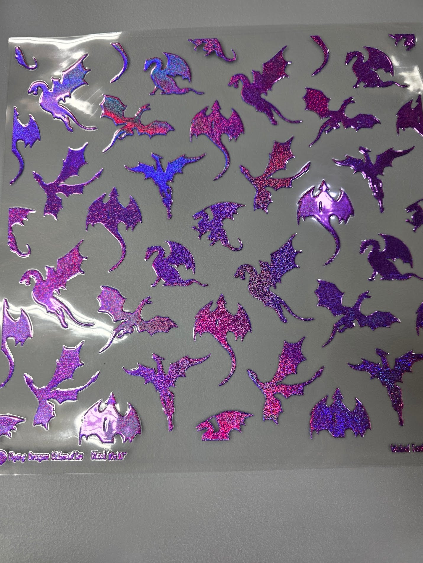 UVDTF Prism Purple Holographic Flying Dragon Silhouettes 11x11"