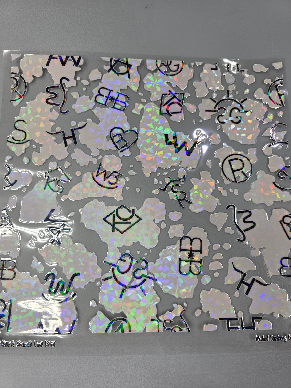 UVDTF Shattered Holographic Ranch Brands Cow Print 11x11"