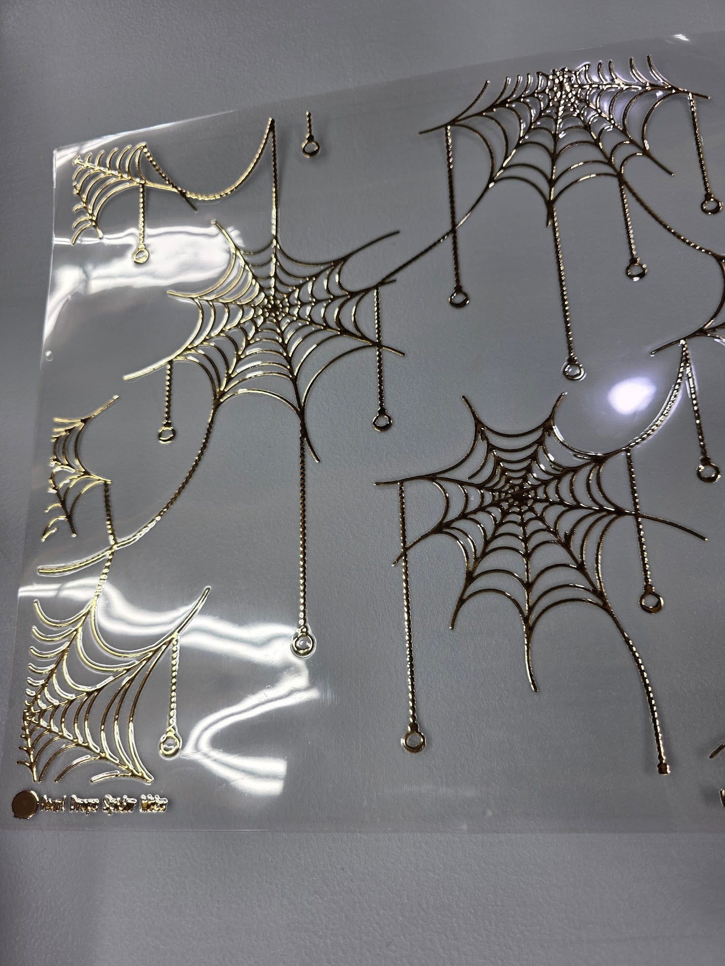 UVDTF Champagne Metallic Pearl Drop Spider Webs 11"x11"