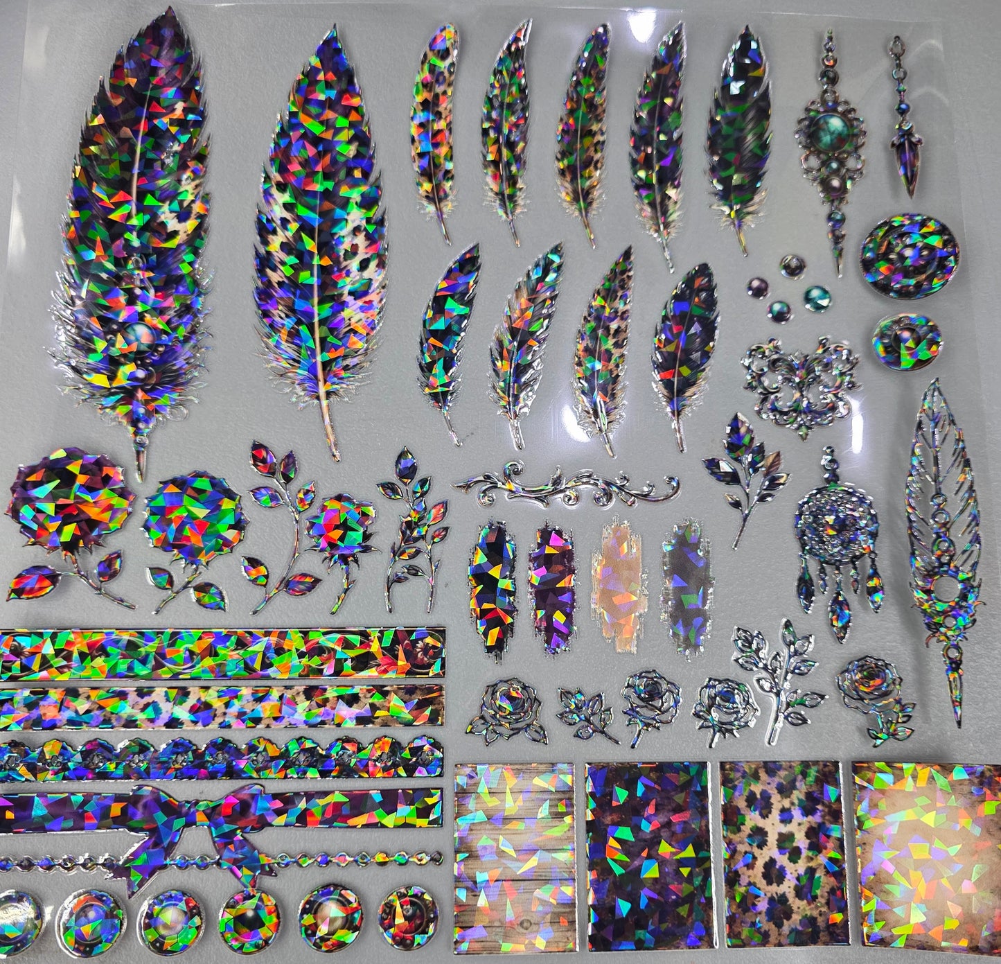 UVDTF Shattered Holographic Amethyst Leopard Feathers 11"x11"
