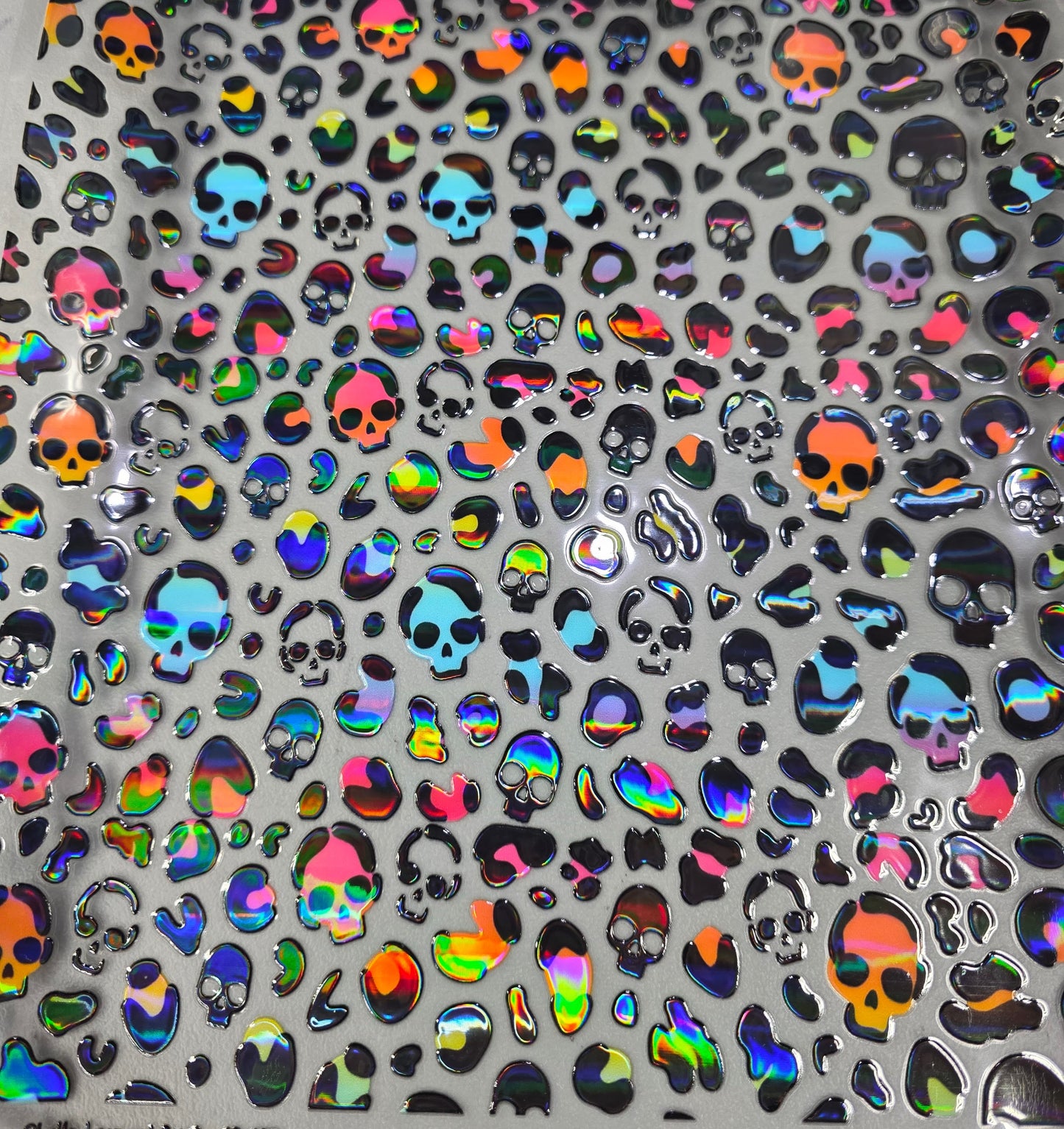 UVDTF Laser Holographic Rainbow Leopard Print Skulls 11"x11"