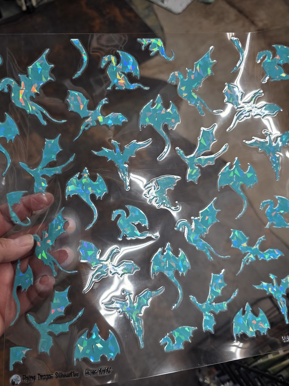 UVDTF Shattered Holographic Flying Dragon Silhouettes Aqua 11"x11"