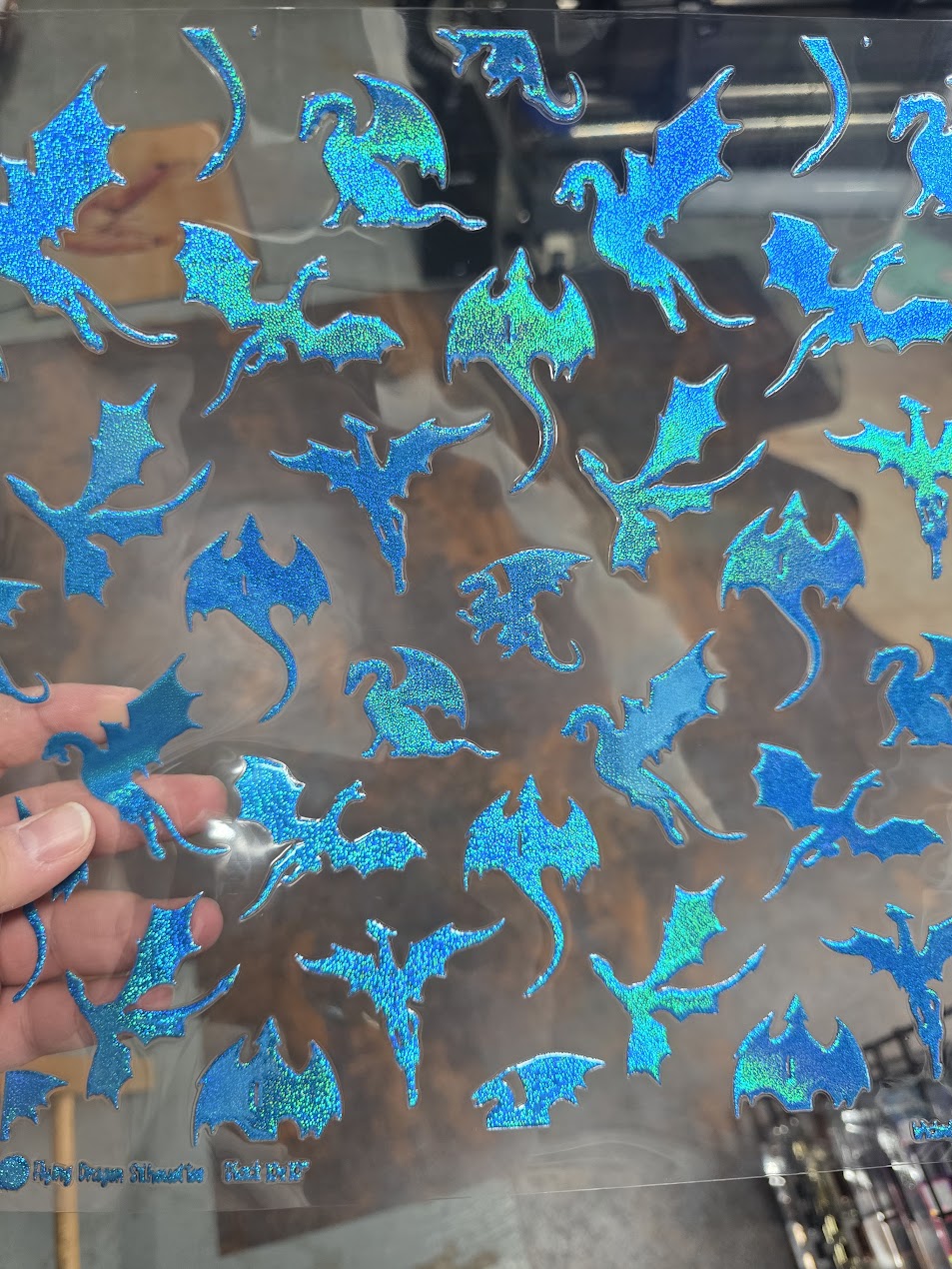 UVDTF Prism Blue Holographic Flying Dragon Silhouettes 11"x11"