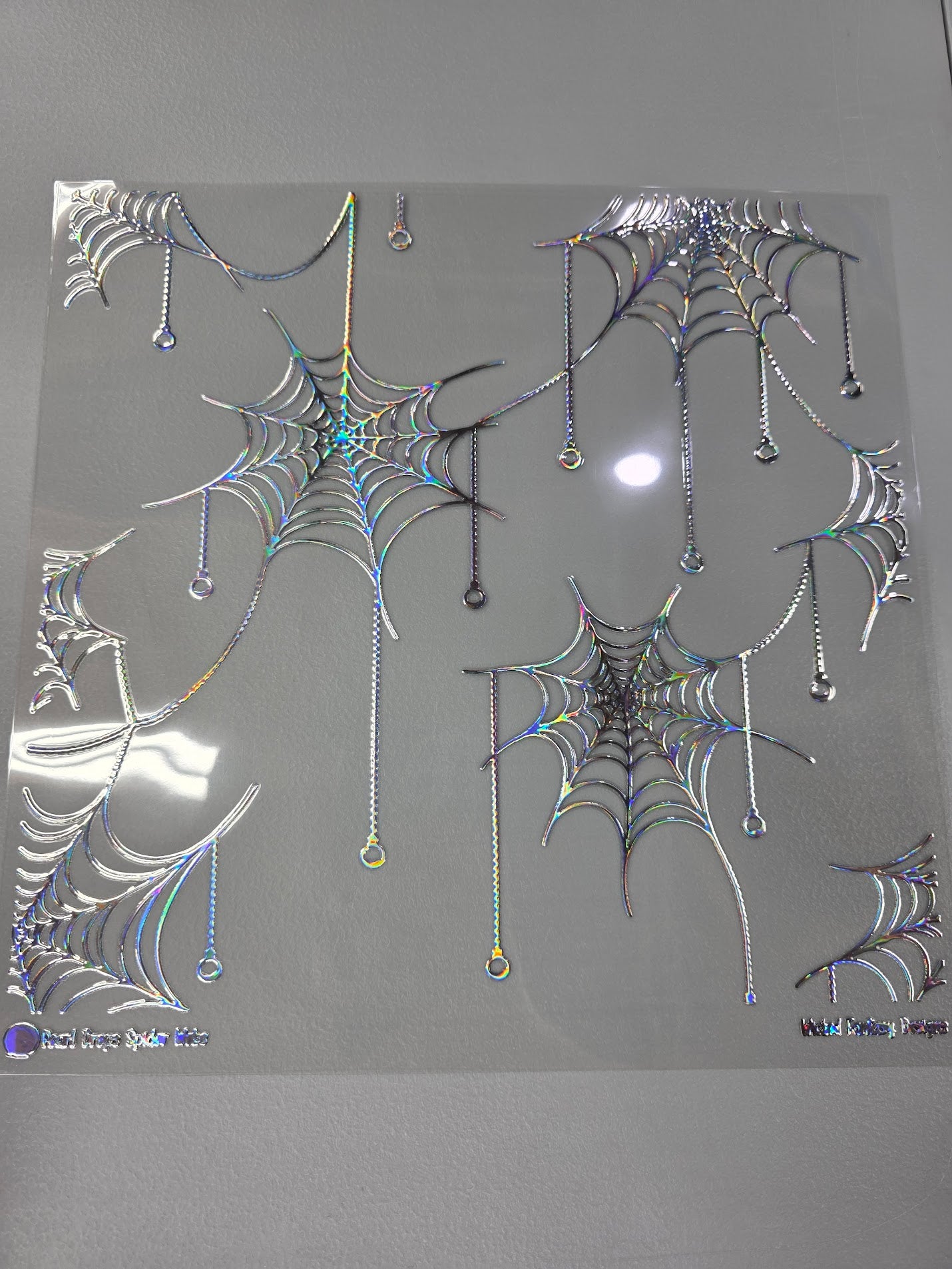 UVDTF Laser Silver Holographic Pearl Draped Spider Webs 11x11"