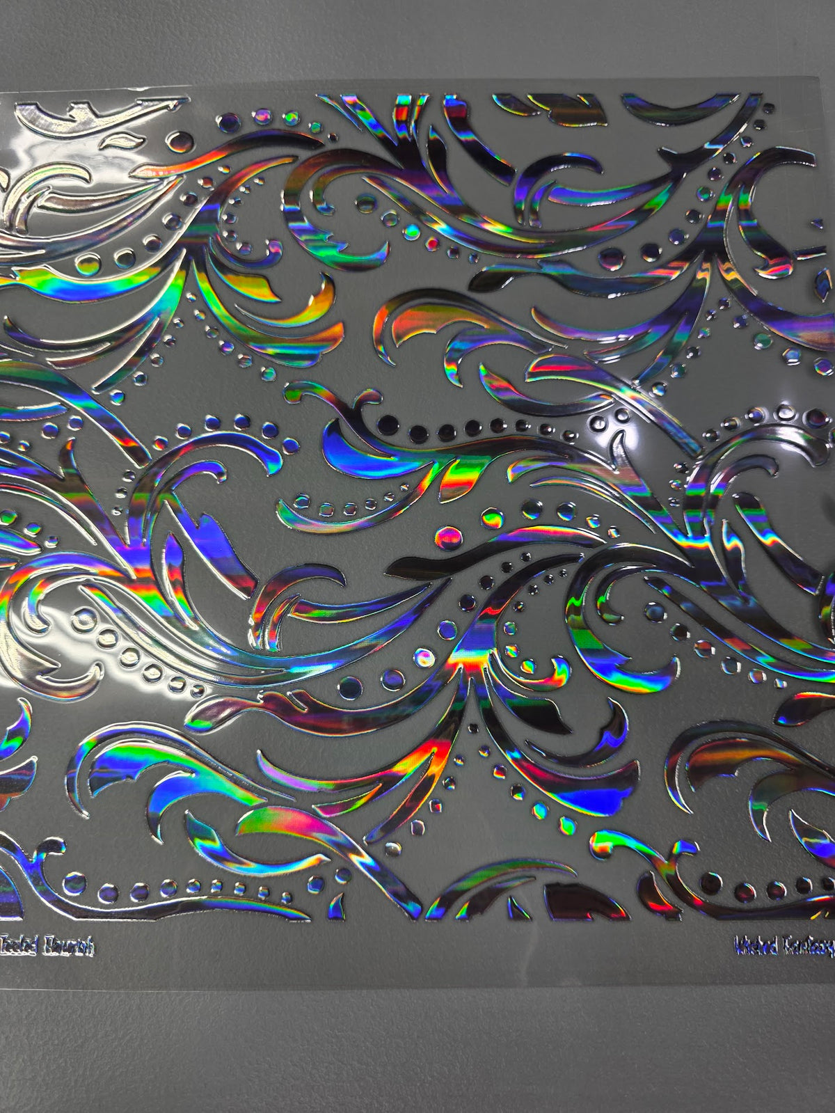 UVDTF Laser Silver Holographic Large Tooled Flourish 11x11"