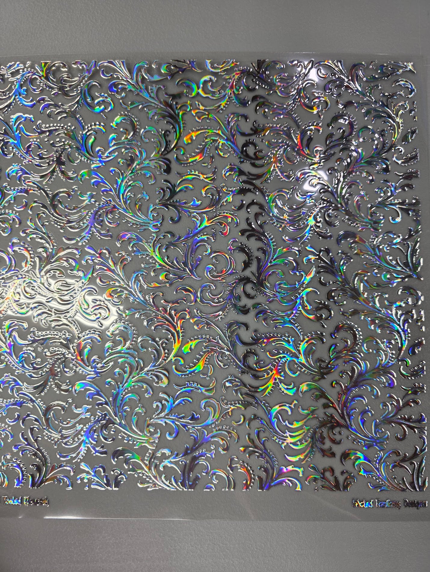 UVDTF Laser Silver Holographic Small Tooled Flourish 11x11"