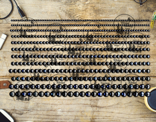 UVDTF Arfvedsonite Beads 6x12"