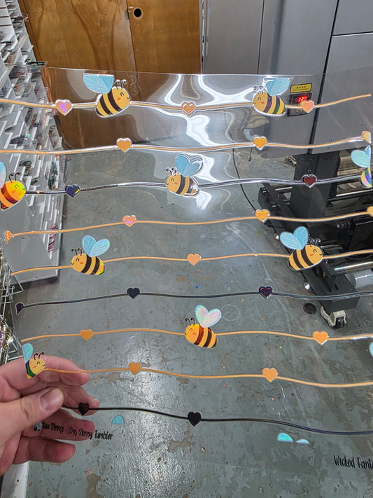 UVDTF Laser Holographic Bee Strings 11"x11"