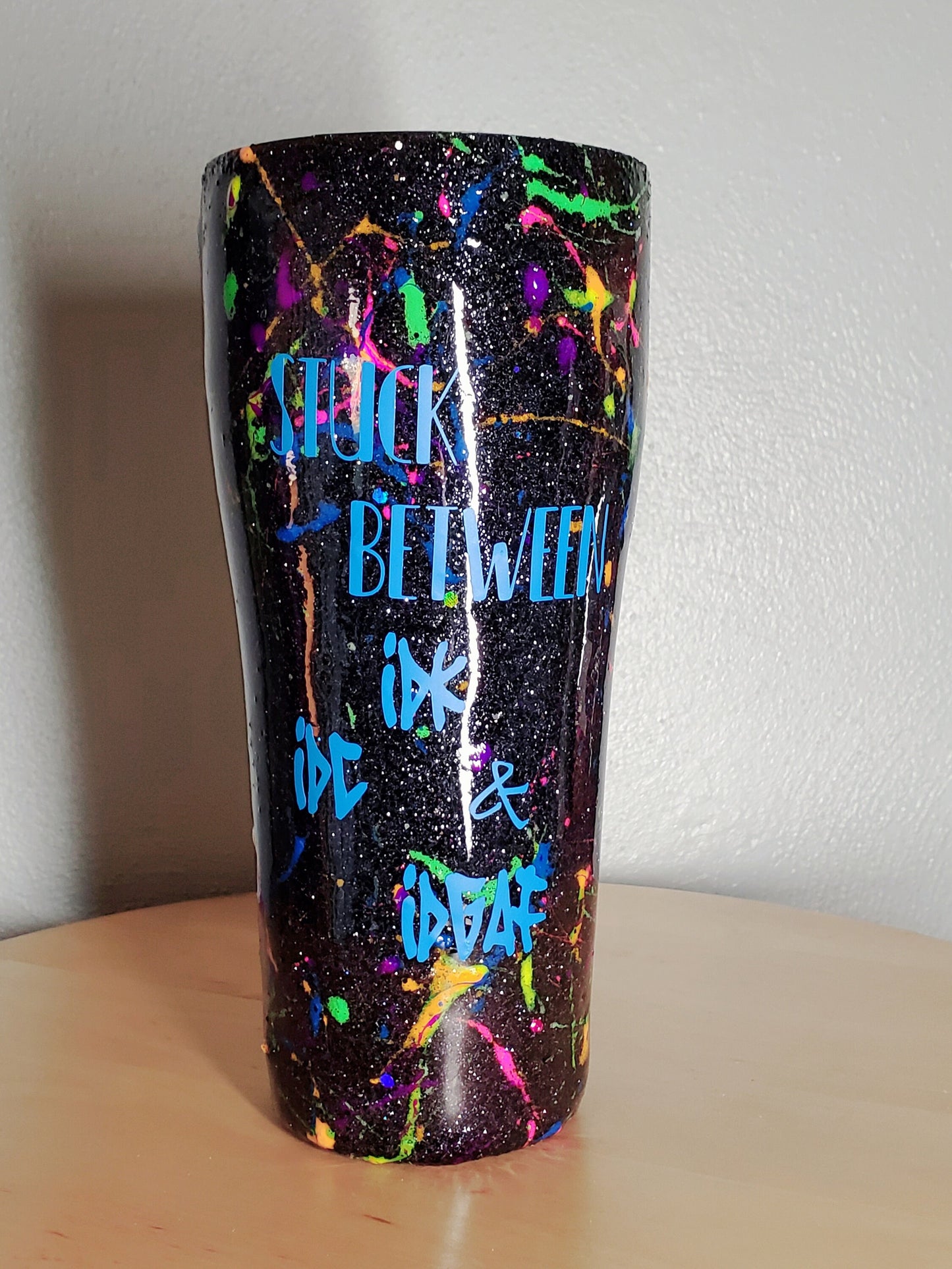 Stuck Between IDK IDC and * Neon paint splatter Glitter Custom Personalized Tumbler Travel Mug